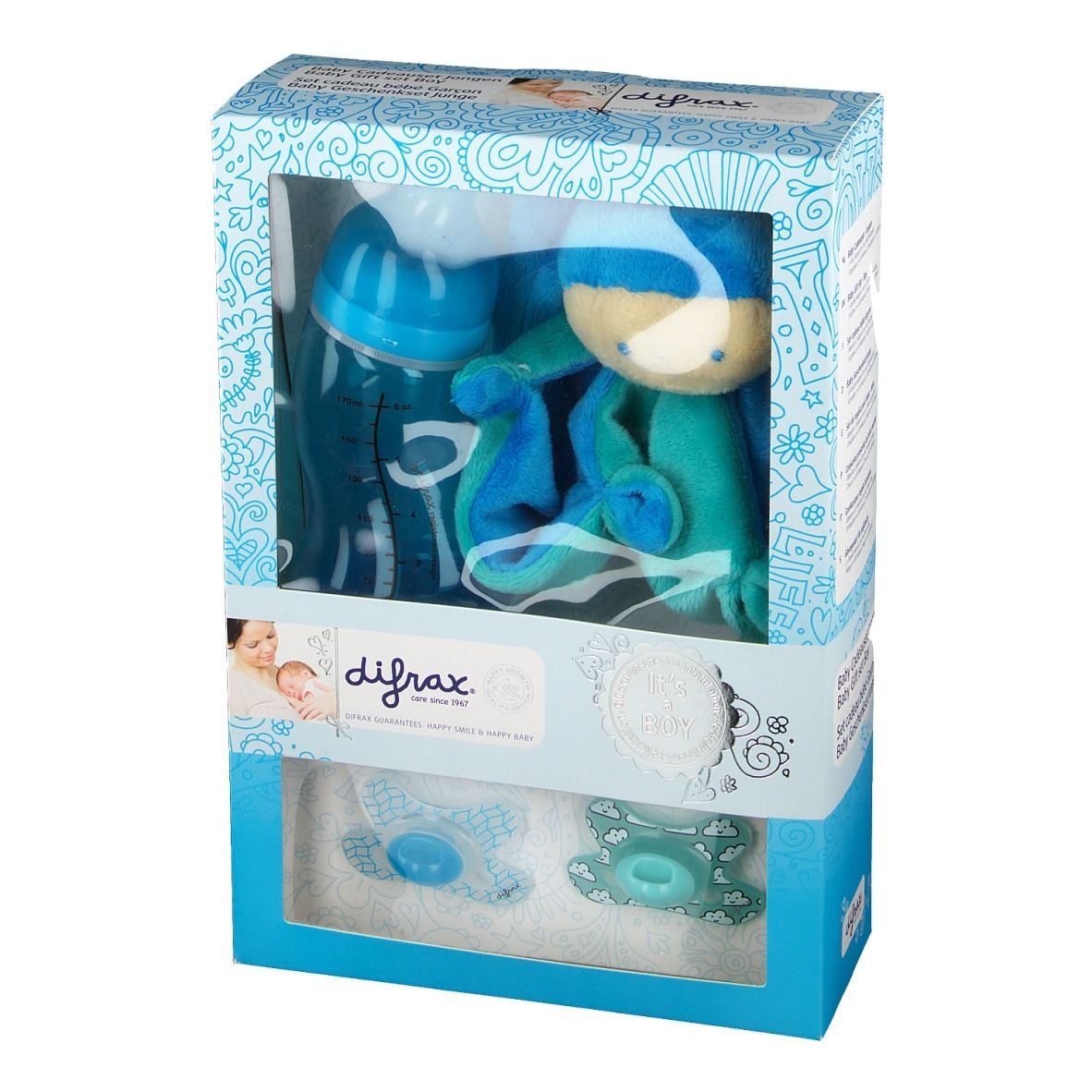 Coffret cadeau avec biberon, sucettes et peluche. Marque : Difrax. Contenu visible. Inscription "It's a Boy".
