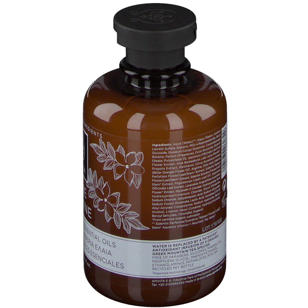 Flacon marron avec bouchon noir. Étiquette avec motif floral et texte. Ingrédients et texte au dos.