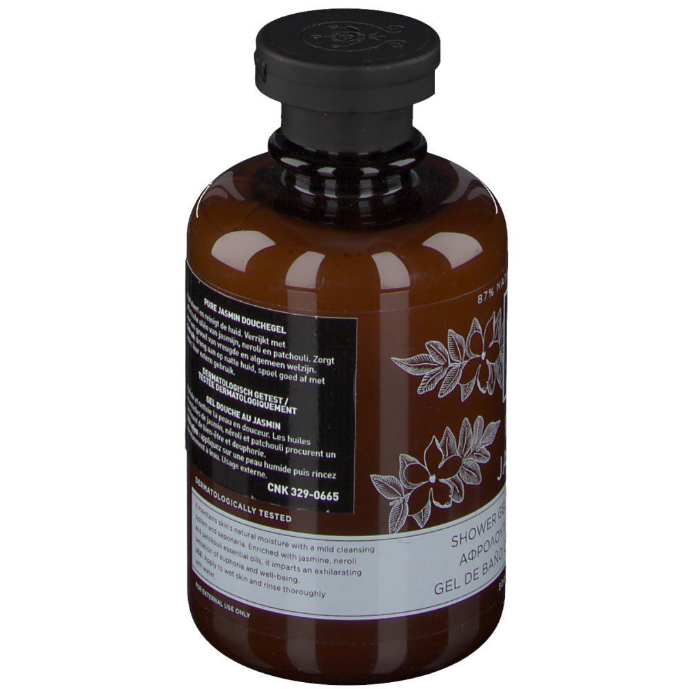 Flacon marron avec bouchon noir. Étiquette avec texte et motif floral. Testé dermatologiquement.