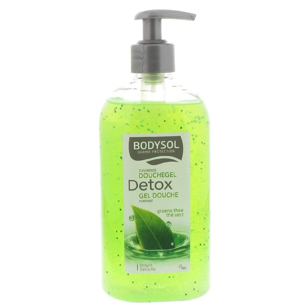 Flacon de gel douche vert avec pompe. Inscription Bodysol Detox. Contient des particules vertes et un symbole de feuille. Nom et marque visibles.