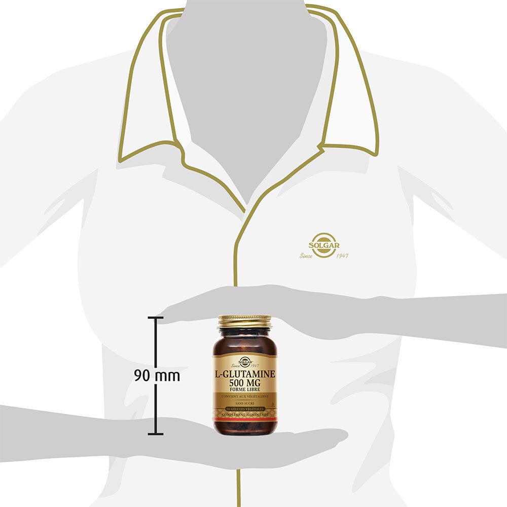 Une personne tient le flacon. Le flacon mesure environ 90 mm de haut. L-Glutamine 500 mg est écrit dessus.
