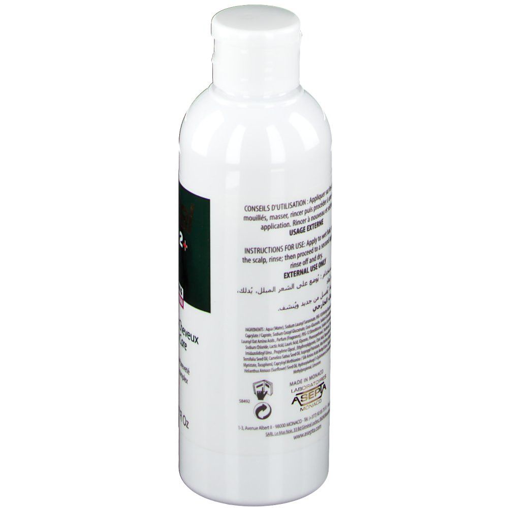 Ecrinal ANP 2+ Shampooing Femme. Dos de la bouteille blanche. Texte et informations d'utilisation.