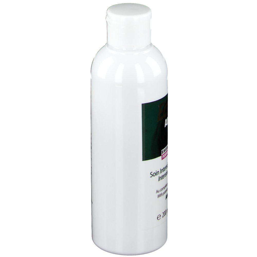 Ecrinal ANP 2+ Shampooing Femme. Bouteille blanche avec étiquette verte. Texte: Soin Intensif des Cheveux.