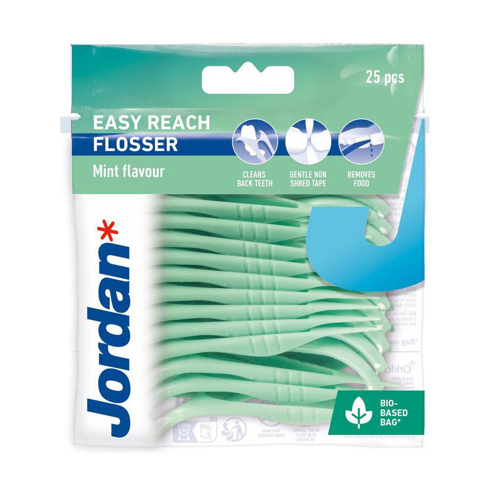 Paquet de flossers. Flossers verts dans un sachet transparent. Inscription: Easy Reach Flosser, 25 pièces, Cool Mint.