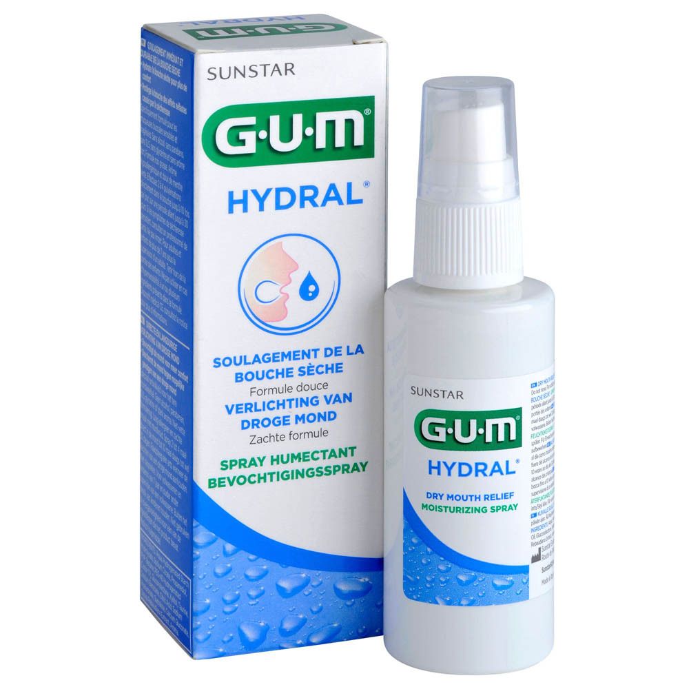 Produit et emballage. Flacon de spray blanc et boîte. Inscription G.U.M HYDRAL. Textes en plusieurs langues.