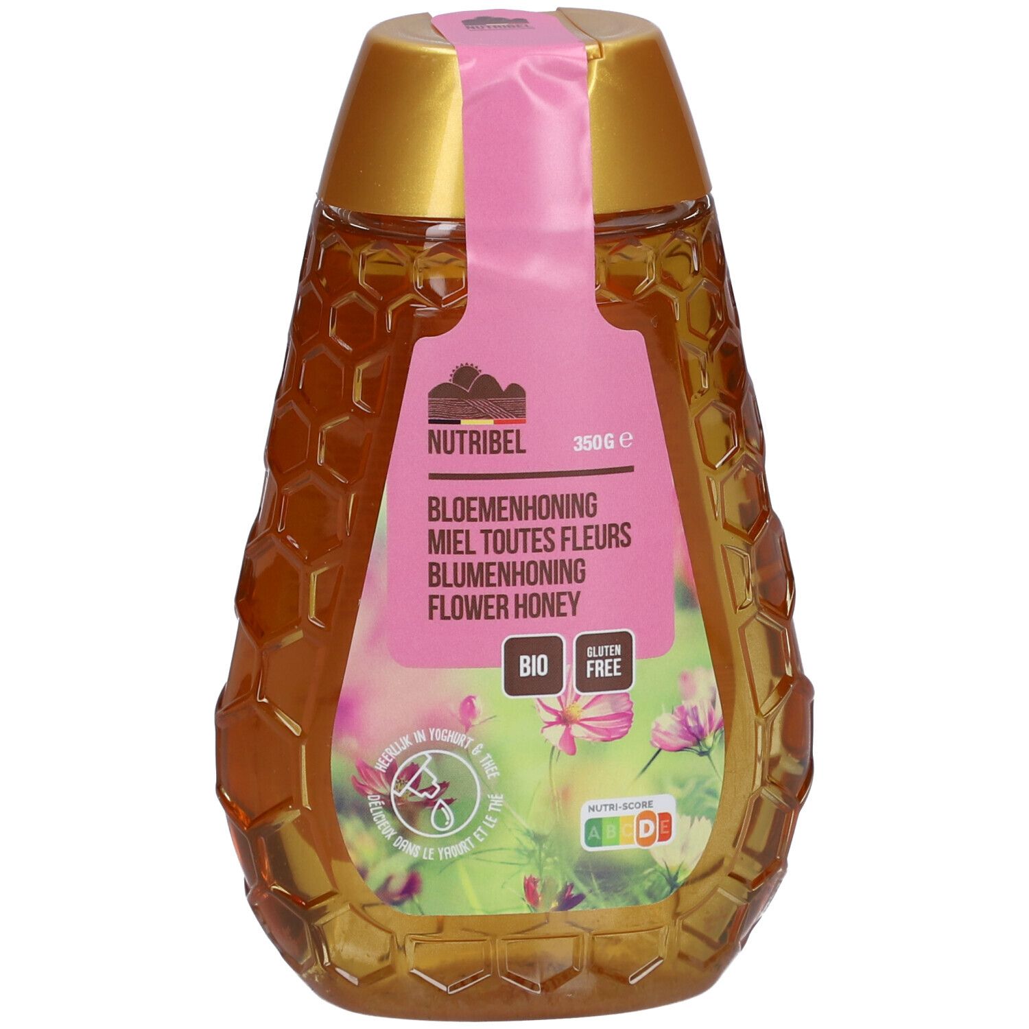 Flacon de miel en forme de nid d'abeilles. Étiquette avec nom du produit, label bio et informations nutritionnelles. Bouchon rose.
