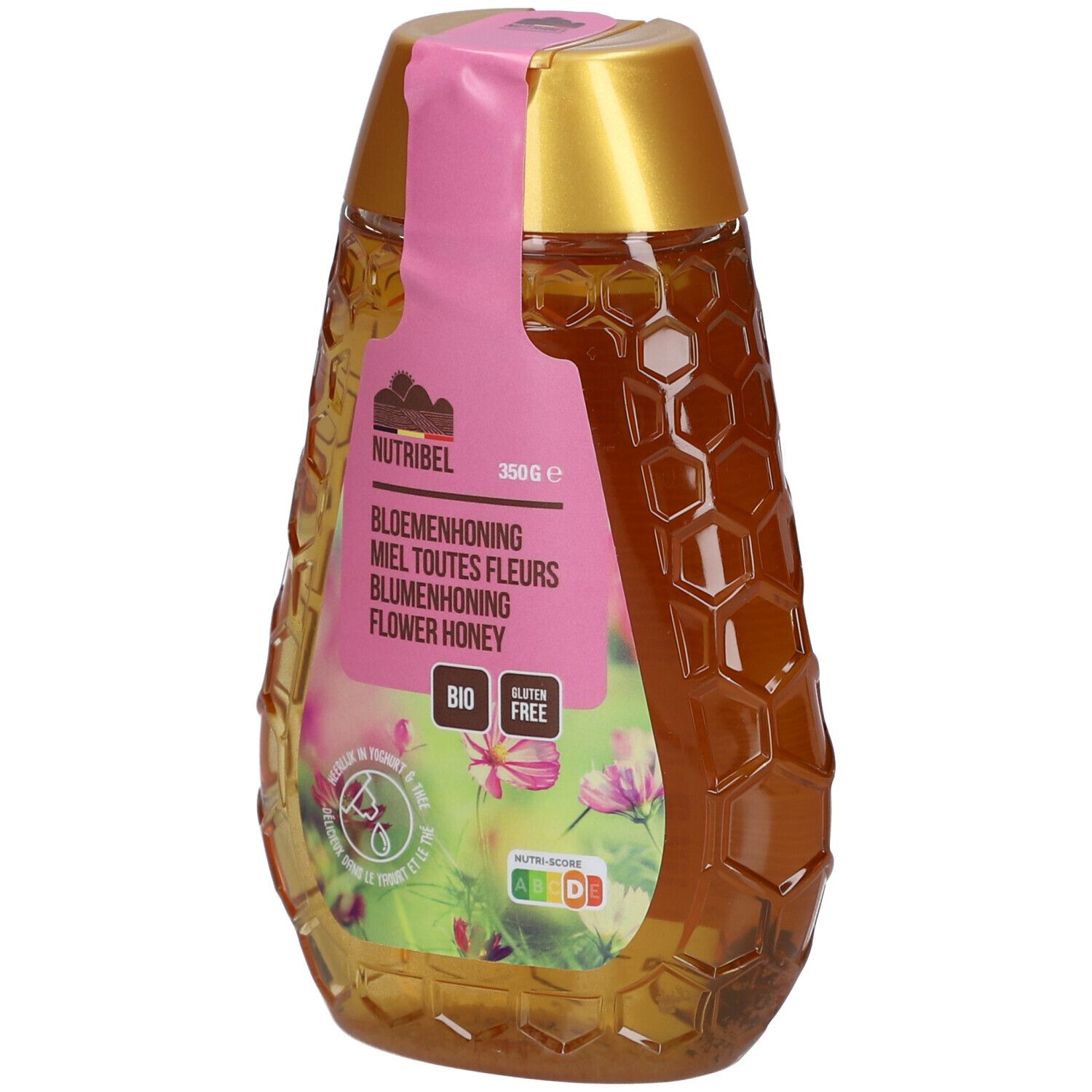 Flacon de miel en forme de nid d'abeilles. Étiquette avec nom du produit, label bio et informations nutritionnelles. Bouchon rose.