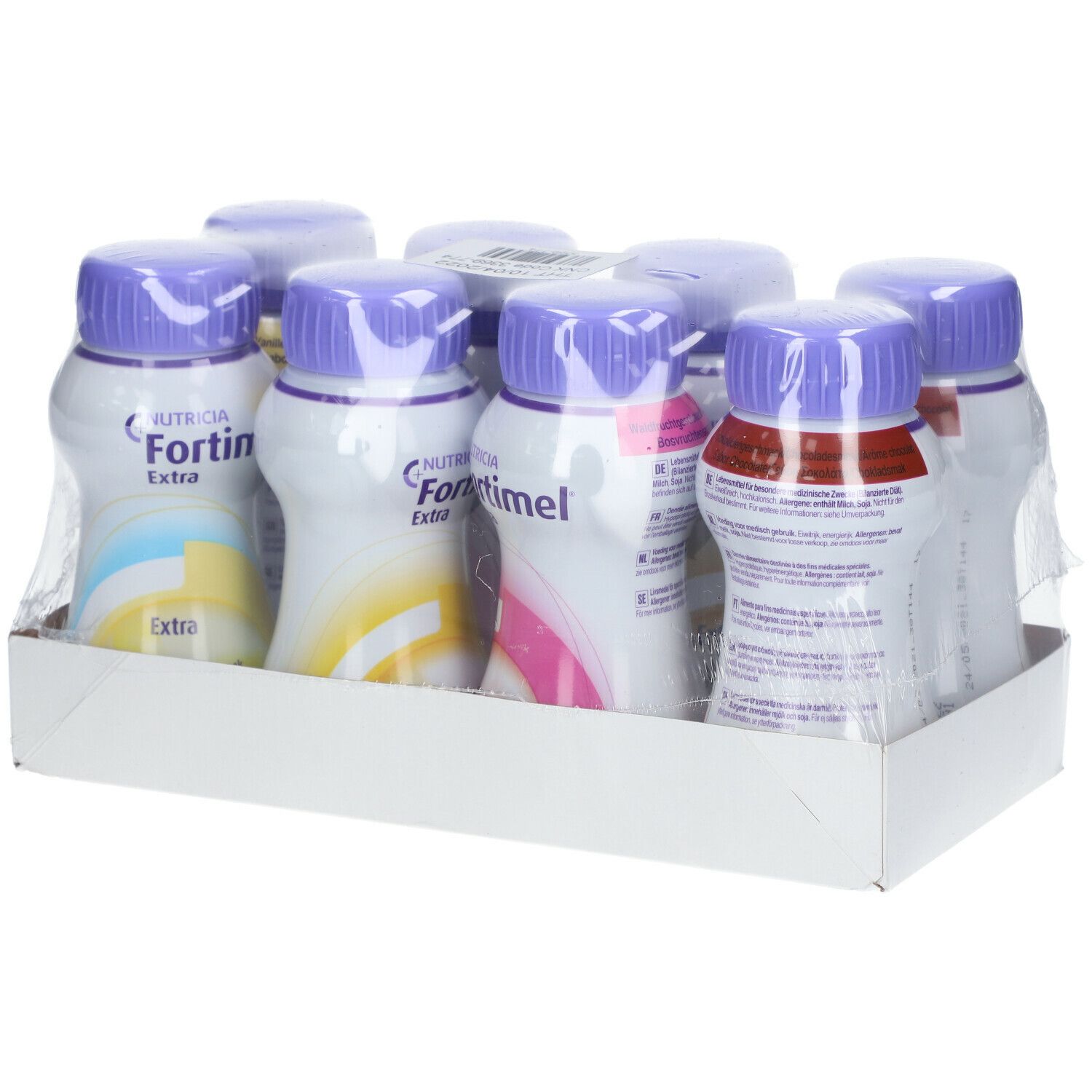 Emballage de bouteilles. Inscription 'Fortimel extra'. Bouteilles avec bouchons violets et étiquettes blanches. Emballé dans du film plastique.