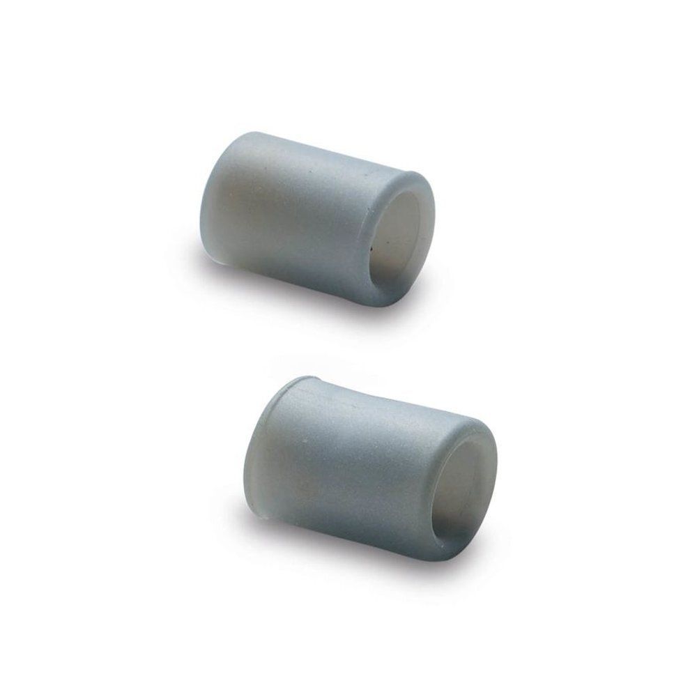 Deux coussins cylindriques gris. Fond clair et neutre.