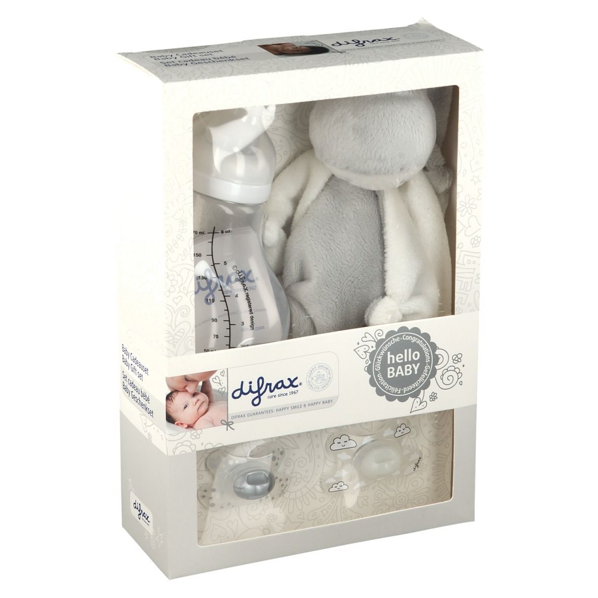 Coffret cadeau avec biberon, sucettes et peluche. Emballage avec fenêtre. Marque difrax®.