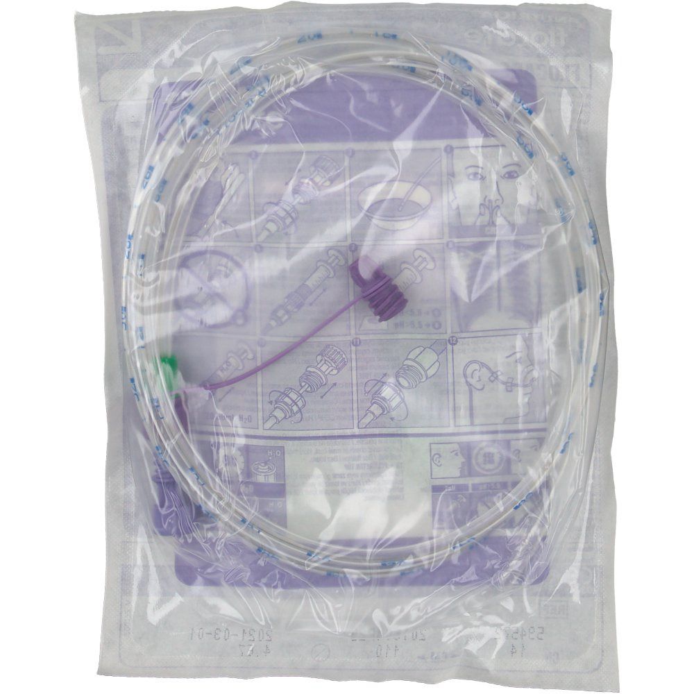 Sonde médicale emballée. Tube transparent, éléments violets et verts. Emballé dans du plastique.