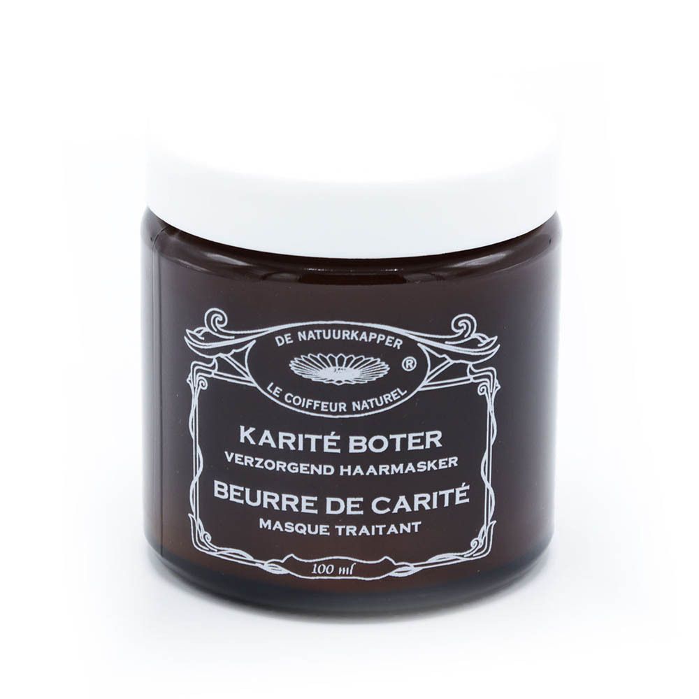 Pot brun avec couvercle blanc. Inscription: Karité Boter, Beurre de Karité, Masque traitant. 100 ml.