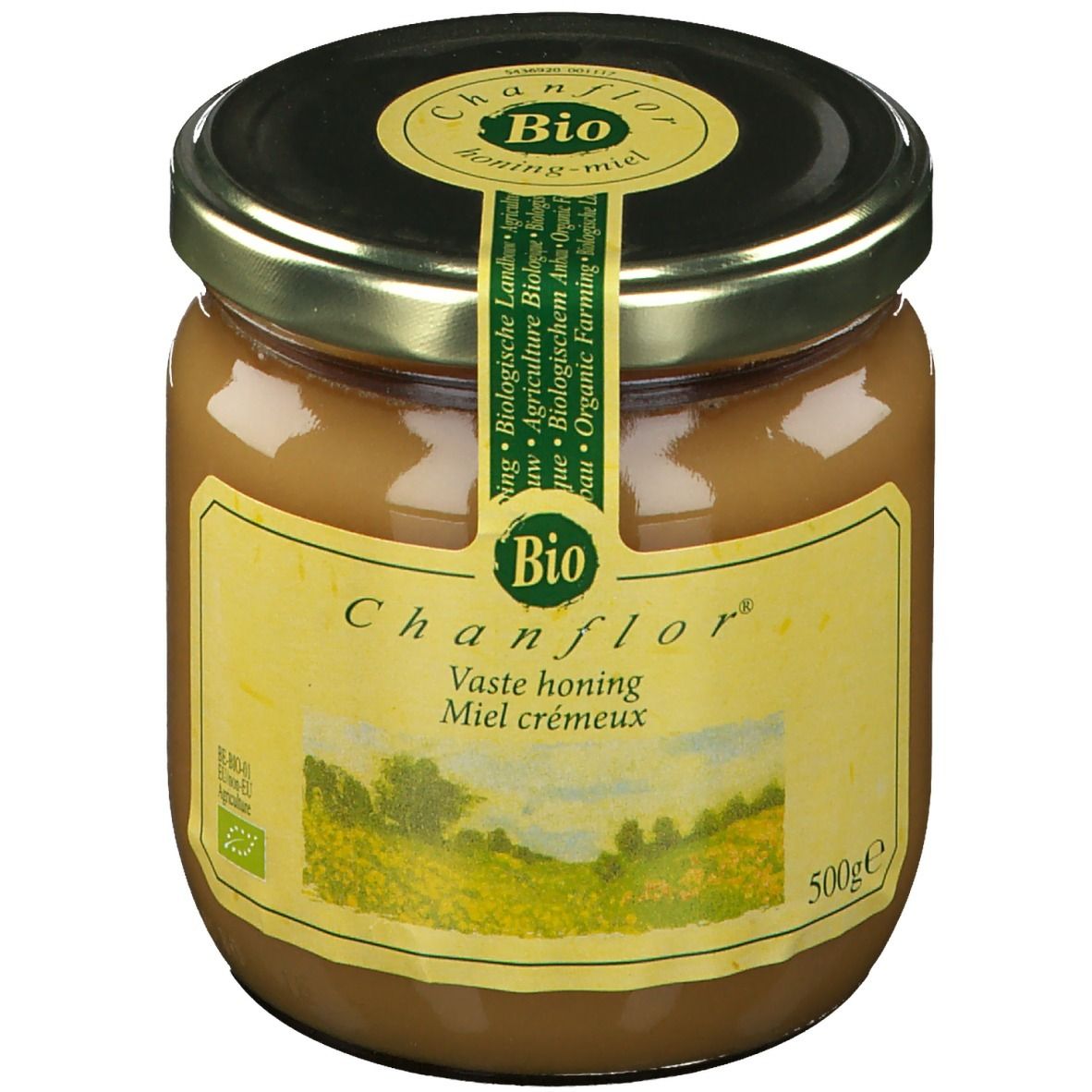 Pot de miel avec couvercle. Étiquette avec "Chanflor", "Bio" et paysage. Inscription "Vaste honing Miel crémeux".