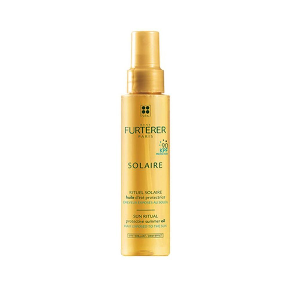 Flacon spray doré René Furterer Solaire huile protectrice pour cheveux, KPF 50+.