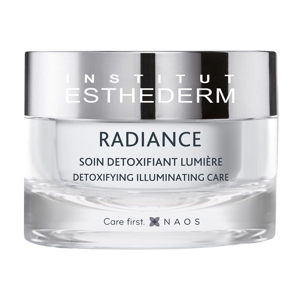 Pot en verre avec contenu blanc. Inscription: INSTITUT ESTHEDERM, RADIANCE, SOIN DÉTOXIFIANT LUMIÈRE, DETOXIFYING ILLUMINATING CARE.