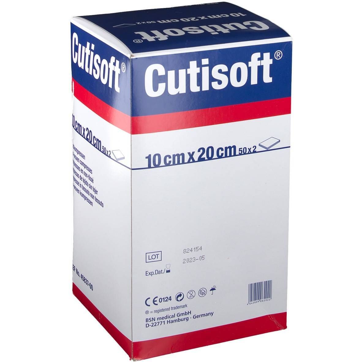 Emballage Cutisoft®. Compresses 10 cm x 20 cm. Boîte bleue, blanche et rouge. Informations produit et logo.