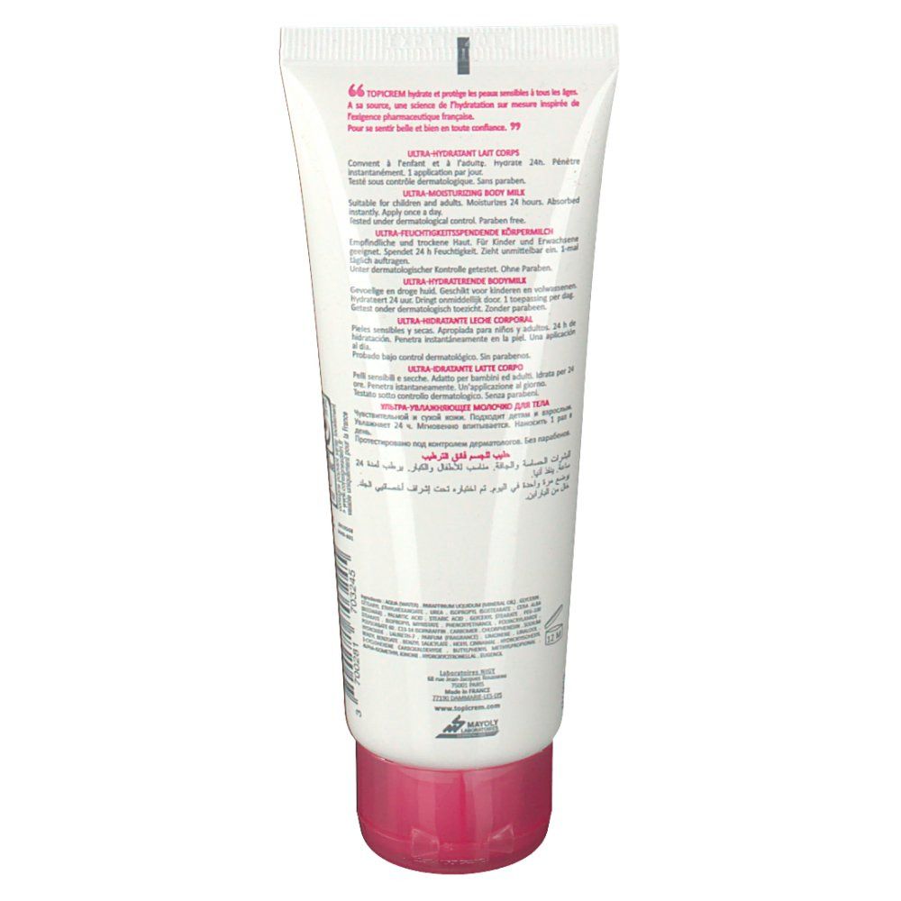 Dos du tube blanc. Texte multilingue. Bouchon rose.