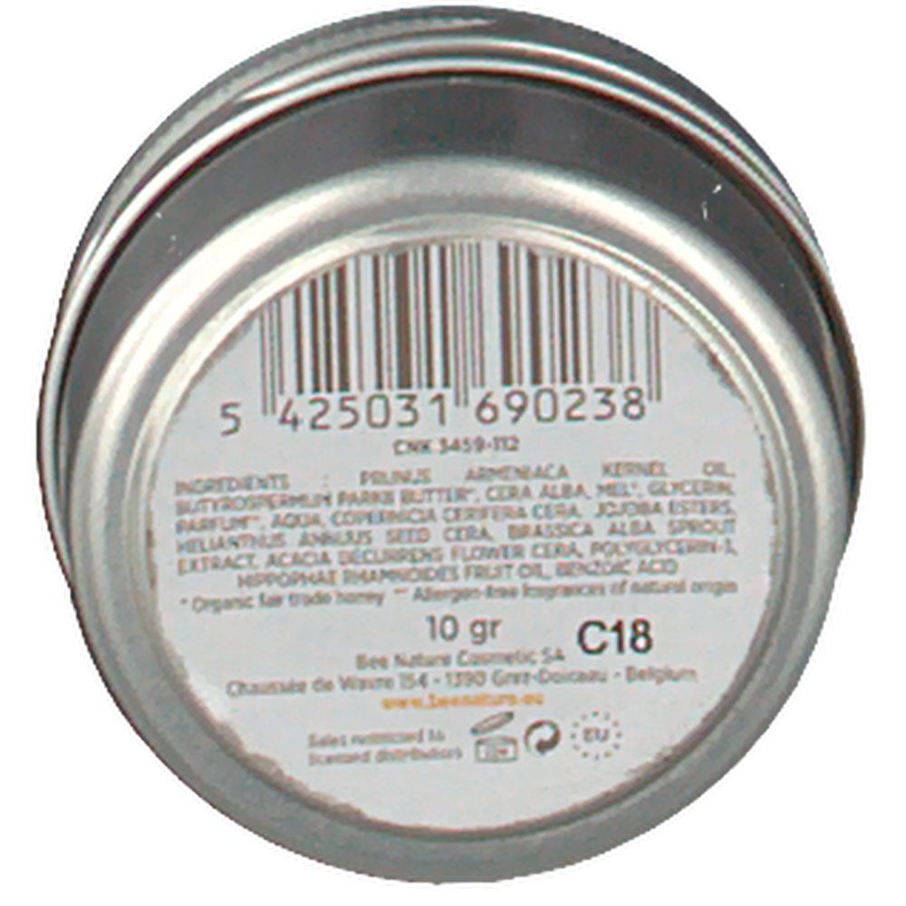 Fond de pot rond avec code-barres et ingrédients. Texte: 10 gr. bee nature Cosmetic. Adresse et logo. Texte en anglais.