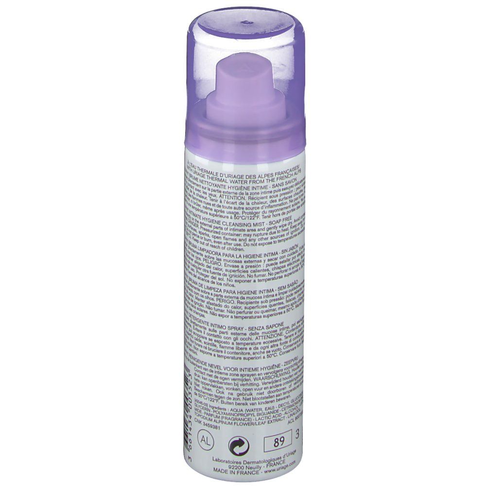 Flacon cylindrique avec vaporisateur. Inscriptions violettes et blanches. Texte: Uriage, Gyn-Phy, Brume Nettoyante. Capuchon transparent.