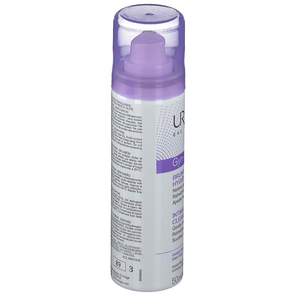 Flacon cylindrique avec vaporisateur. Inscriptions violettes et blanches. Texte: Uriage, Gyn-Phy, Brume Nettoyante. Capuchon transparent.