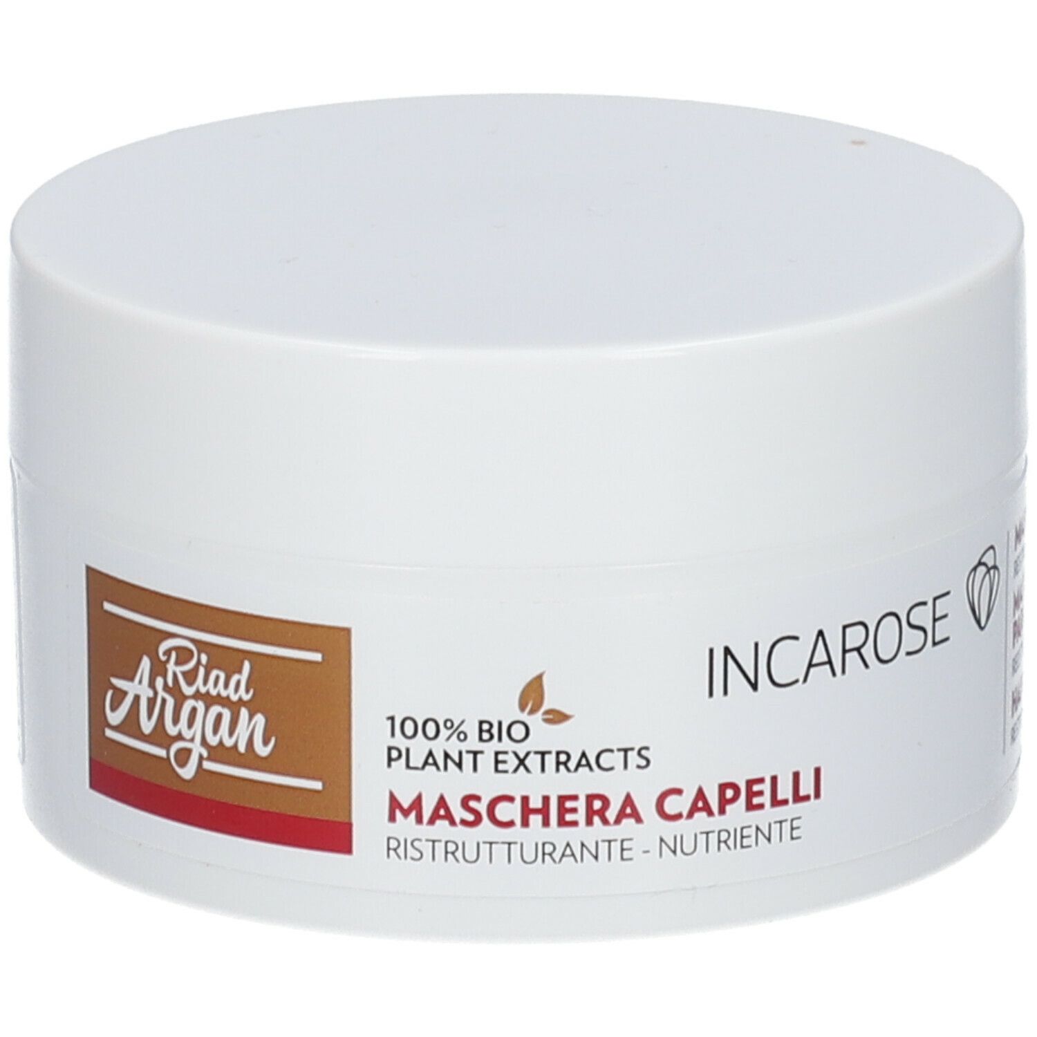 Pot blanc avec couvercle. Inscription: Incarose, Riad Argan, Maschera Capelli. 100% extraits végétaux bio.