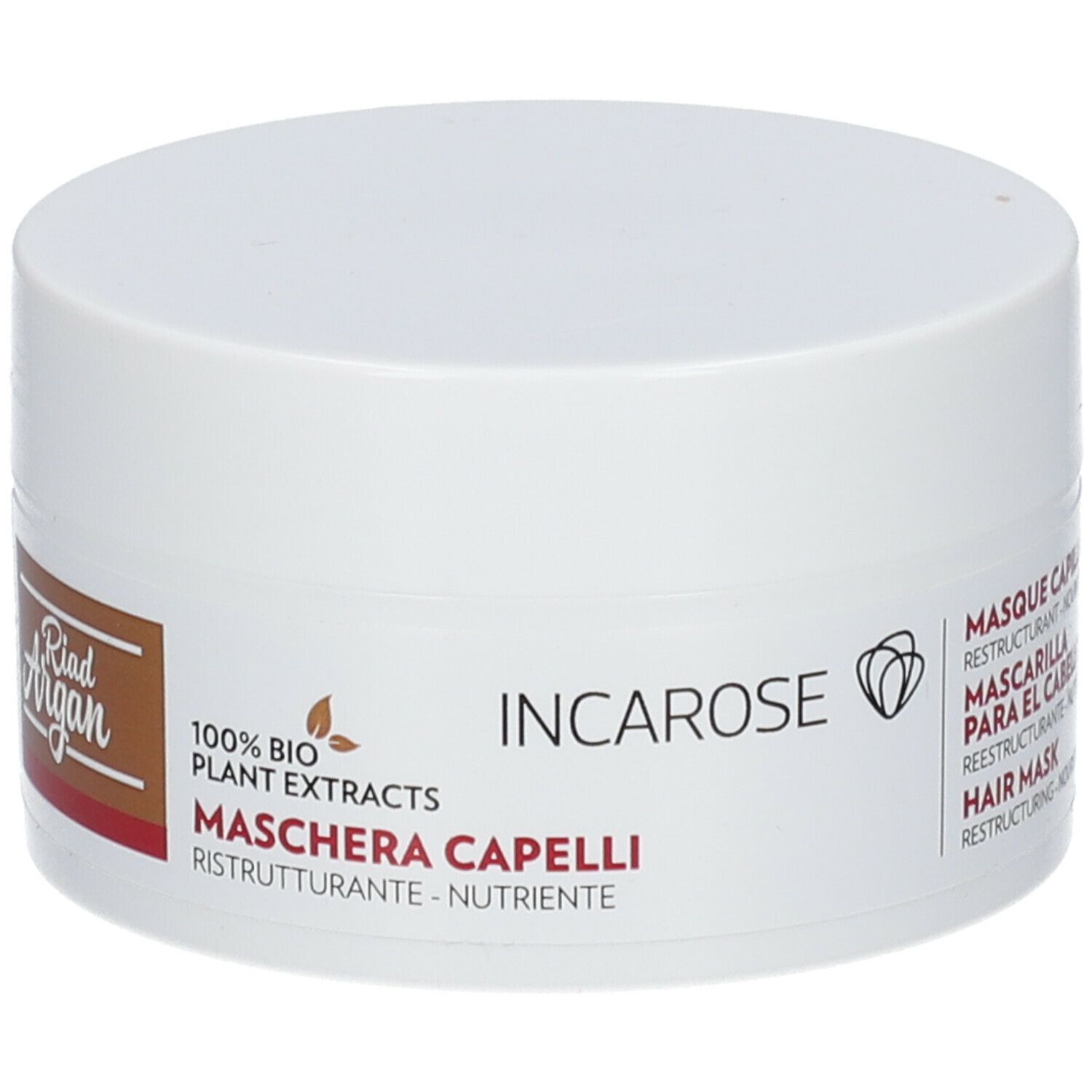 Pot blanc avec couvercle. Inscription: Incarose, Riad Argan, Maschera Capelli. 100% extraits végétaux bio.