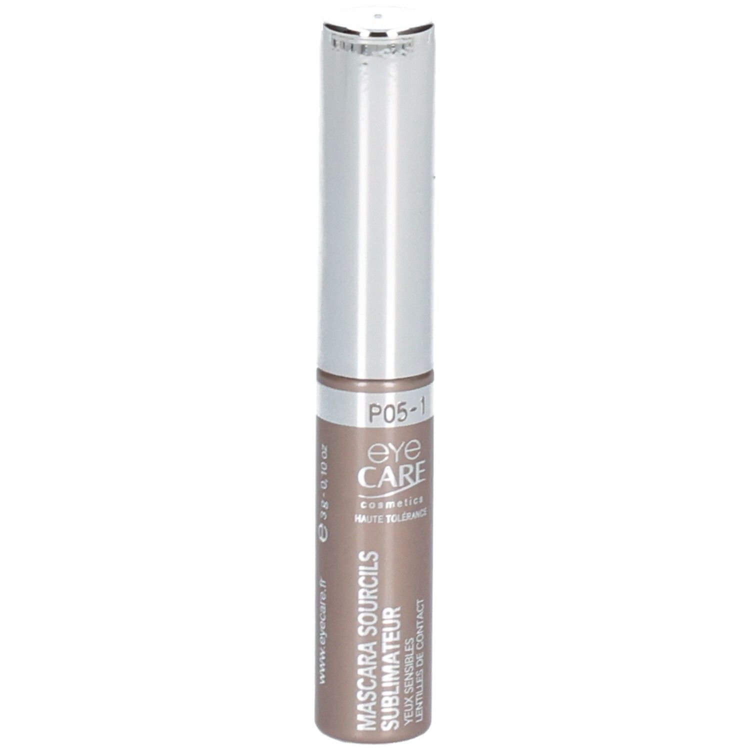 Mascara sourcils brun. Tube cylindrique avec capuchon argenté. Nom du produit et marque visibles.