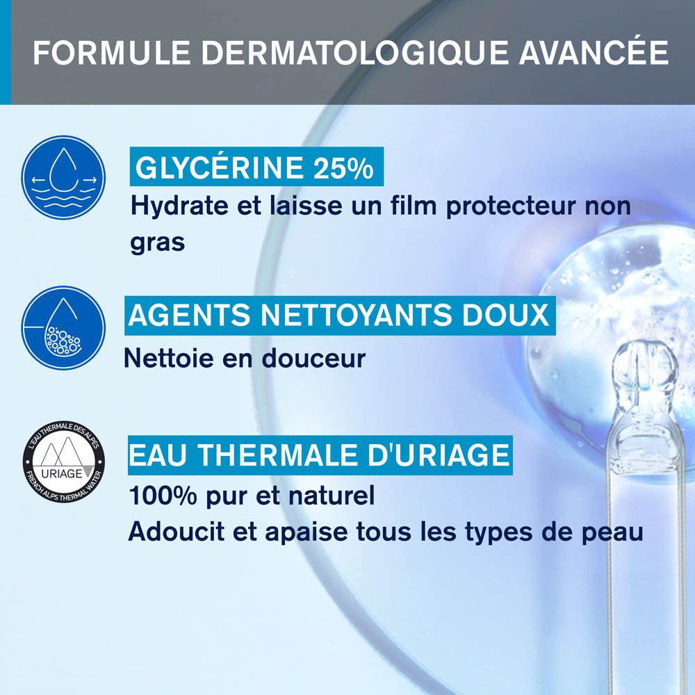 Flacon transparent avec pompe bleue. Inscription : Uriage Eau Thermale, Huile Lavante, Cleansing Oil.
