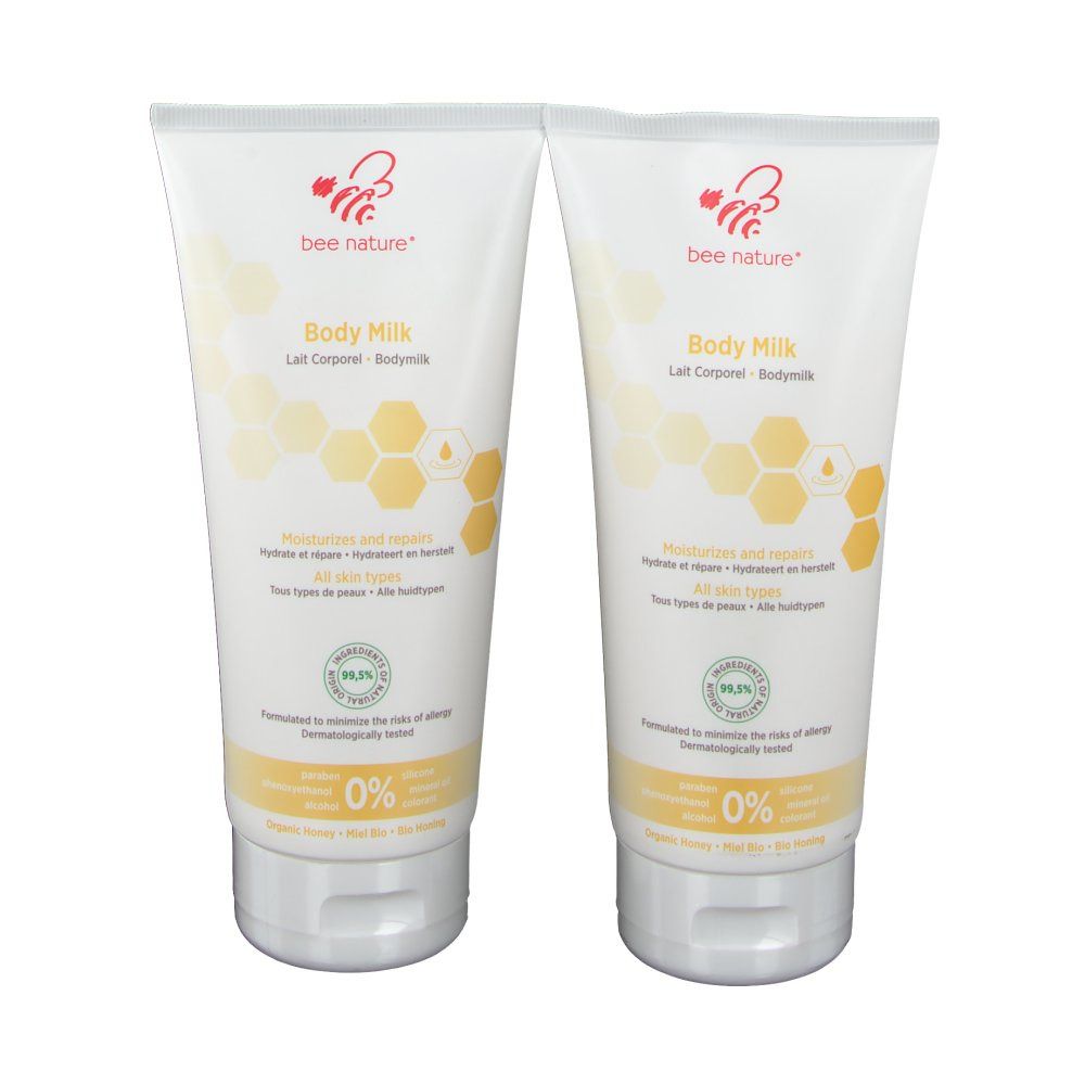 Deux tubes de Body Milk. Tubes blancs avec accents jaunes et informations produit. Logo: Biene Natur.