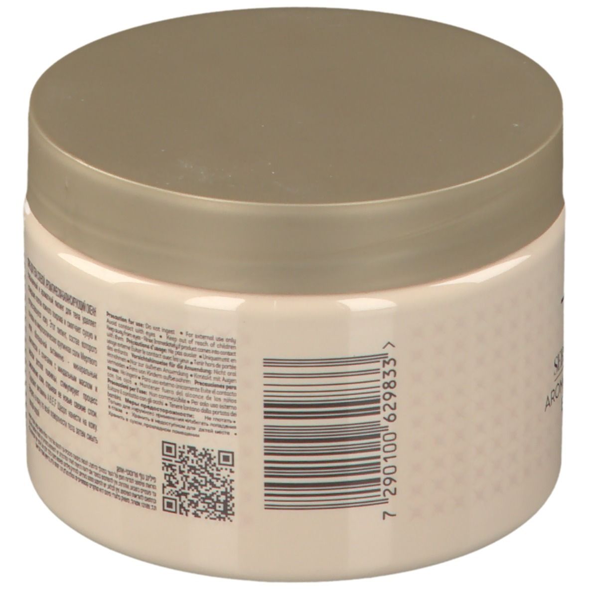 Pot beige avec couvercle. Texte et code-barres au dos. Inscription : -417 Serenity Legend Aromatic Balancing Body Scrub.