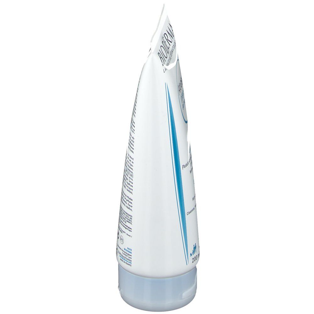 Tube blanc, vue latérale. Bandes bleues et texte. Bouchon bleu. Inscription: BIODERMA, Atoderm Intensive Gel moussant.
