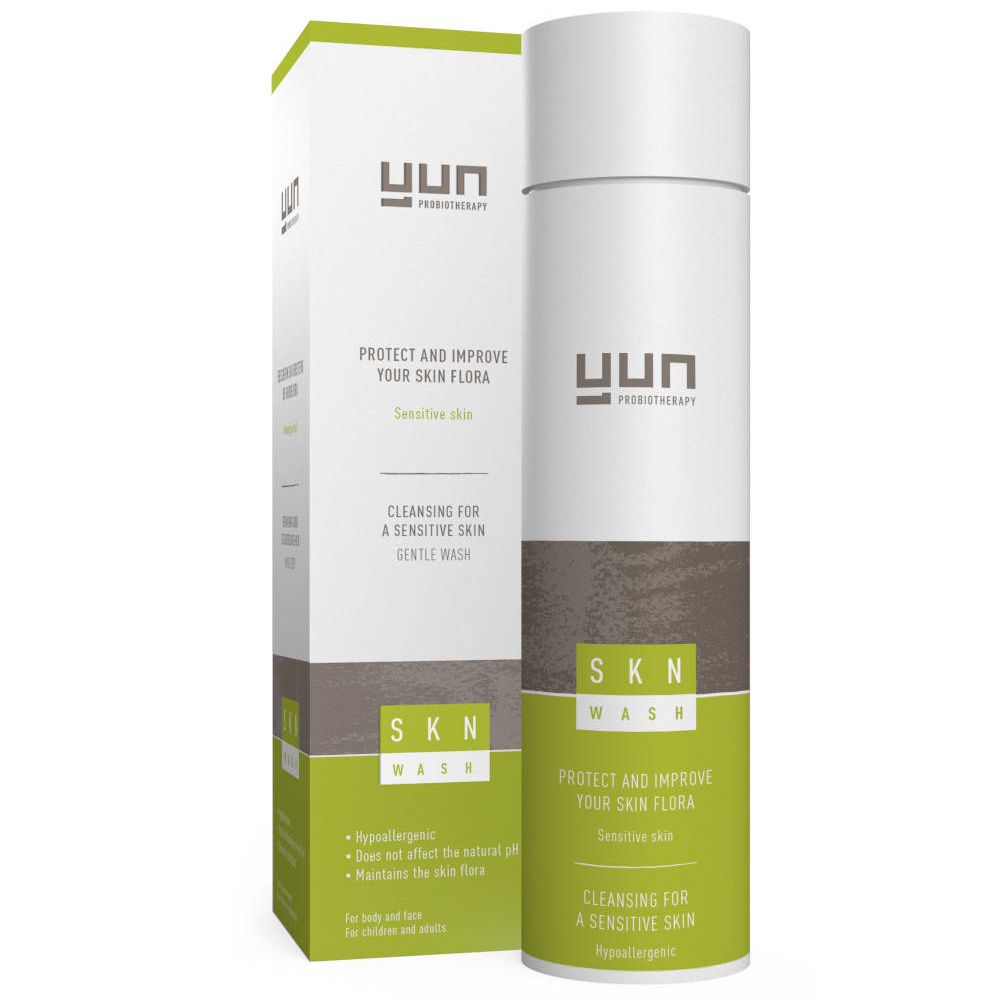 Flacon cylindrique et boîte. Inscription: YUN, SKN WASH. Design vert et blanc. Texte: Protect and improve your skin flora.