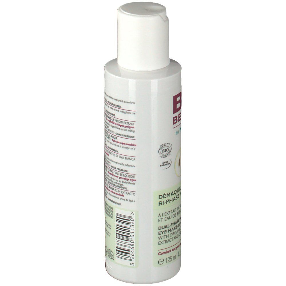 Flacon blanc avec bouchon blanc. Inscriptions et texte au dos. Informations sur le produit.