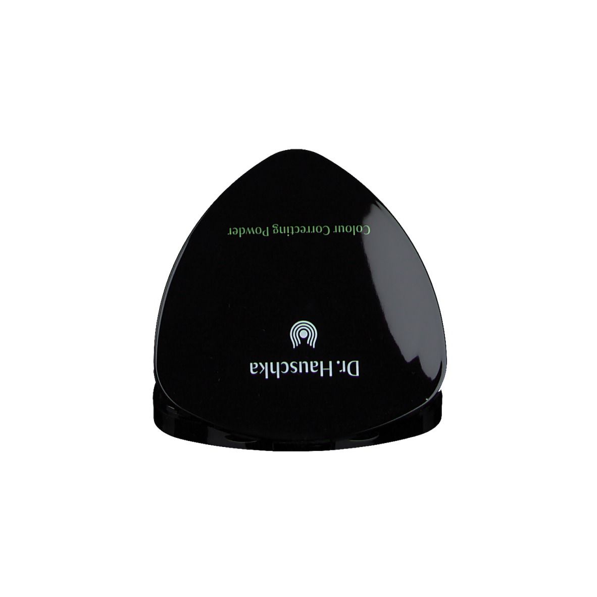 Boîtier noir en forme de goutte avec poudre correctrice. 'Colour Correcting Powder' et 'Dr. Hauschka' sur le couvercle.