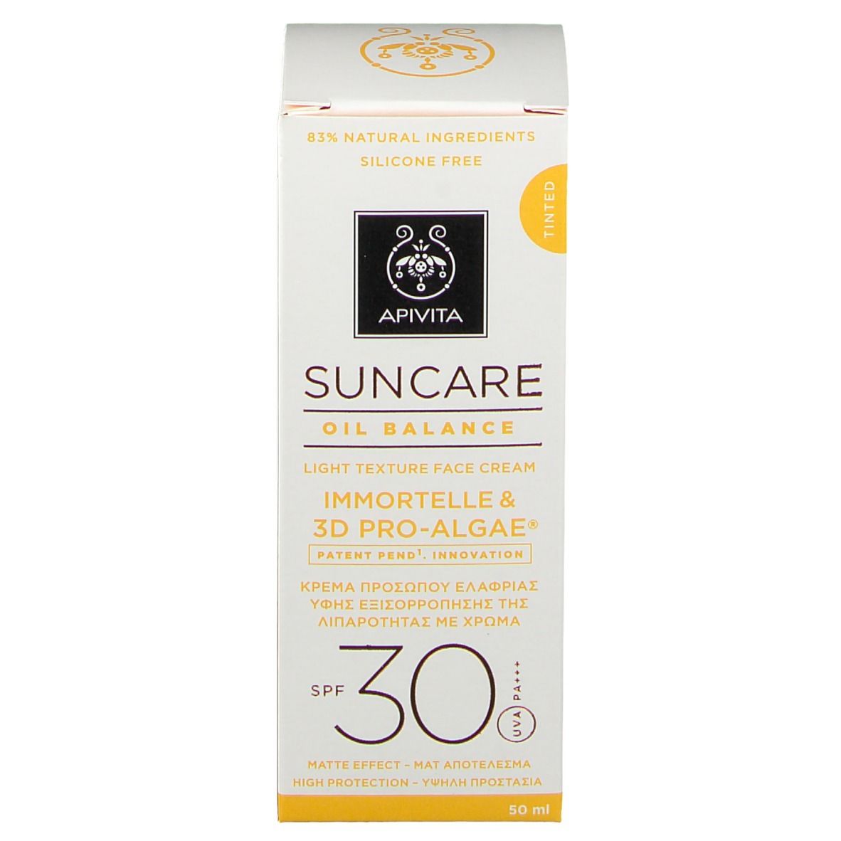 Emballage blanc. Inscription : Apivita Suncare Oil Balance, SPF30. Texture teintée. 83% ingrédients naturels. Sans silicone.