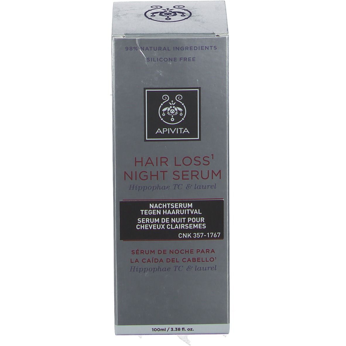 Emballage avec inscription : Apivita Hair Loss Night Serum. Boîte grise avec nom du produit et logo.