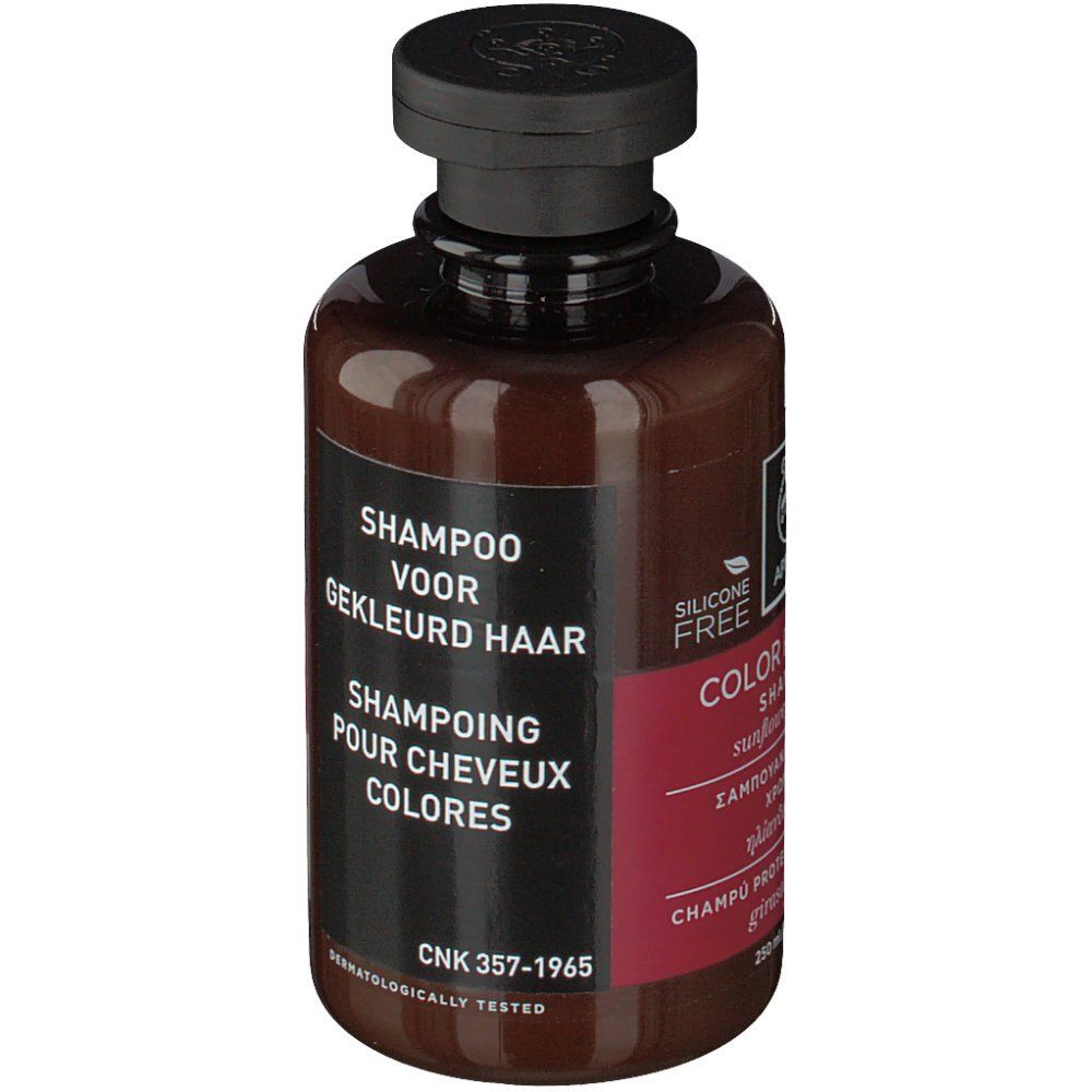 Dos du flacon marron. Étiquette avec texte en néerlandais et français.