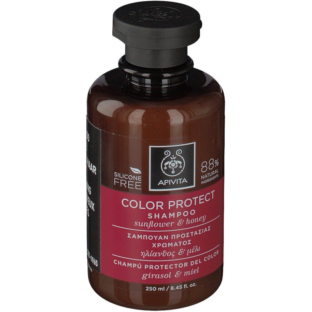 Flacon marron avec bouchon noir. Étiquette avec logo Apivita et 'COLOR PROTECT SHAMPOO'.