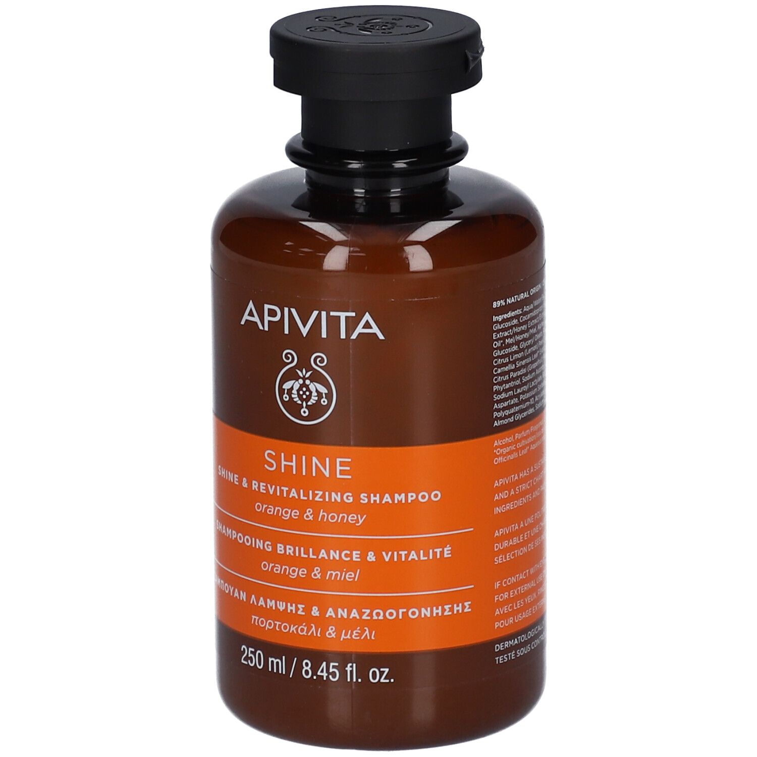 Flacon de shampooing Apivita Shine avec bouchon noir. Récipient brun avec étiquette orange. 250 ml.
