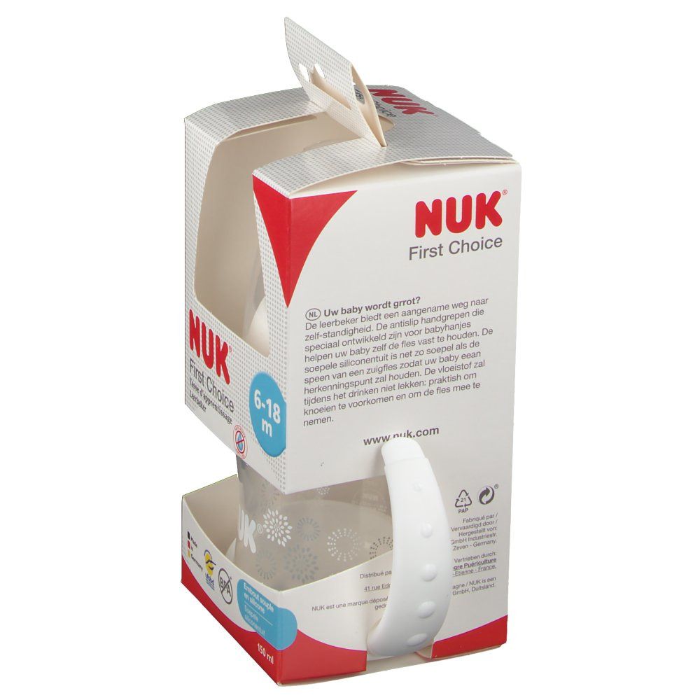 Emballage du biberon d'apprentissage NUK First Choice. Biberon avec poignées visible dans l'emballage ouvert.