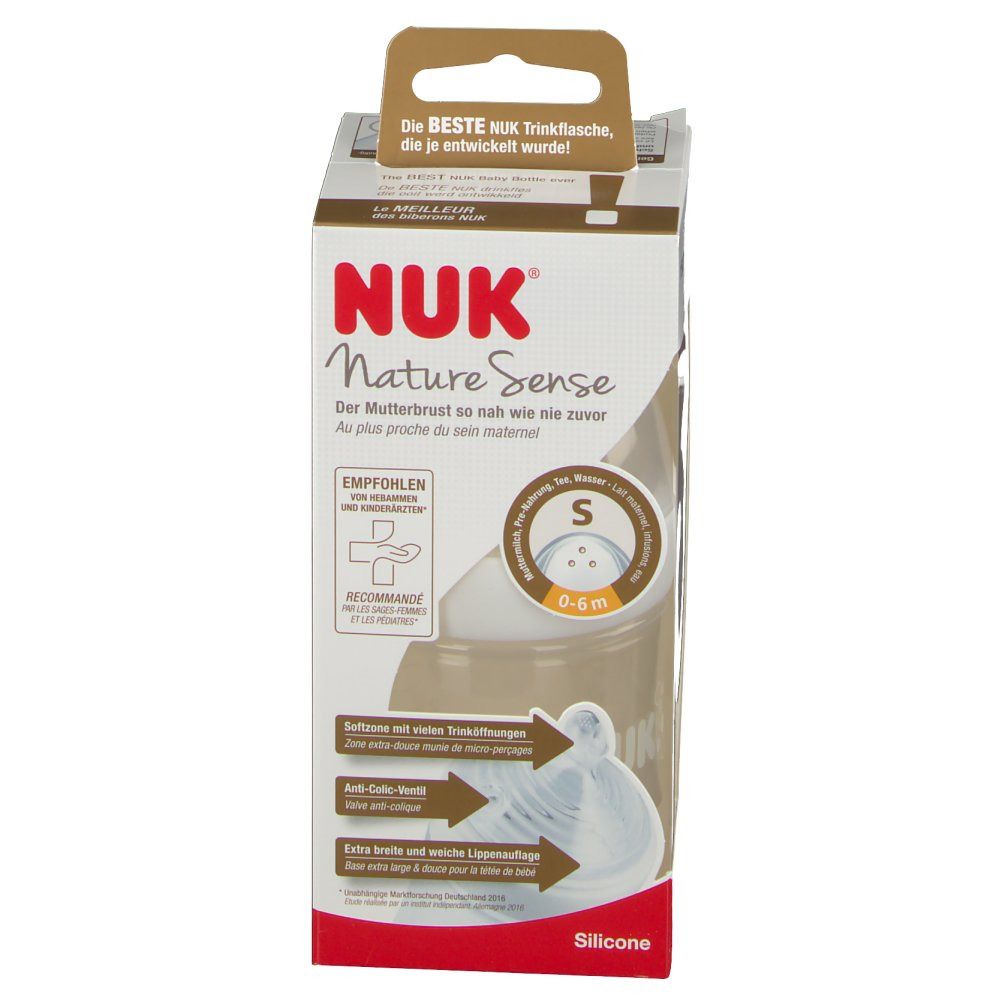 Emballage NUK Nature Sense. Biberon avec tétine en silicone, corps marron et couvercle blanc. Recommandé pour les 0-6 mois.