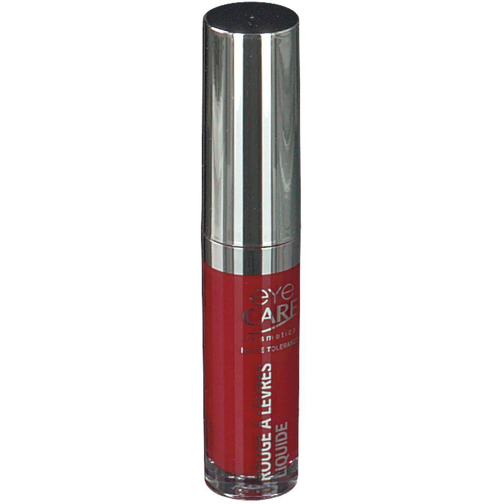 Rouge à lèvres liquide rouge dans un flacon cylindrique transparent avec un capuchon argenté. Inscription : Rouge à Lèvres Liquide.