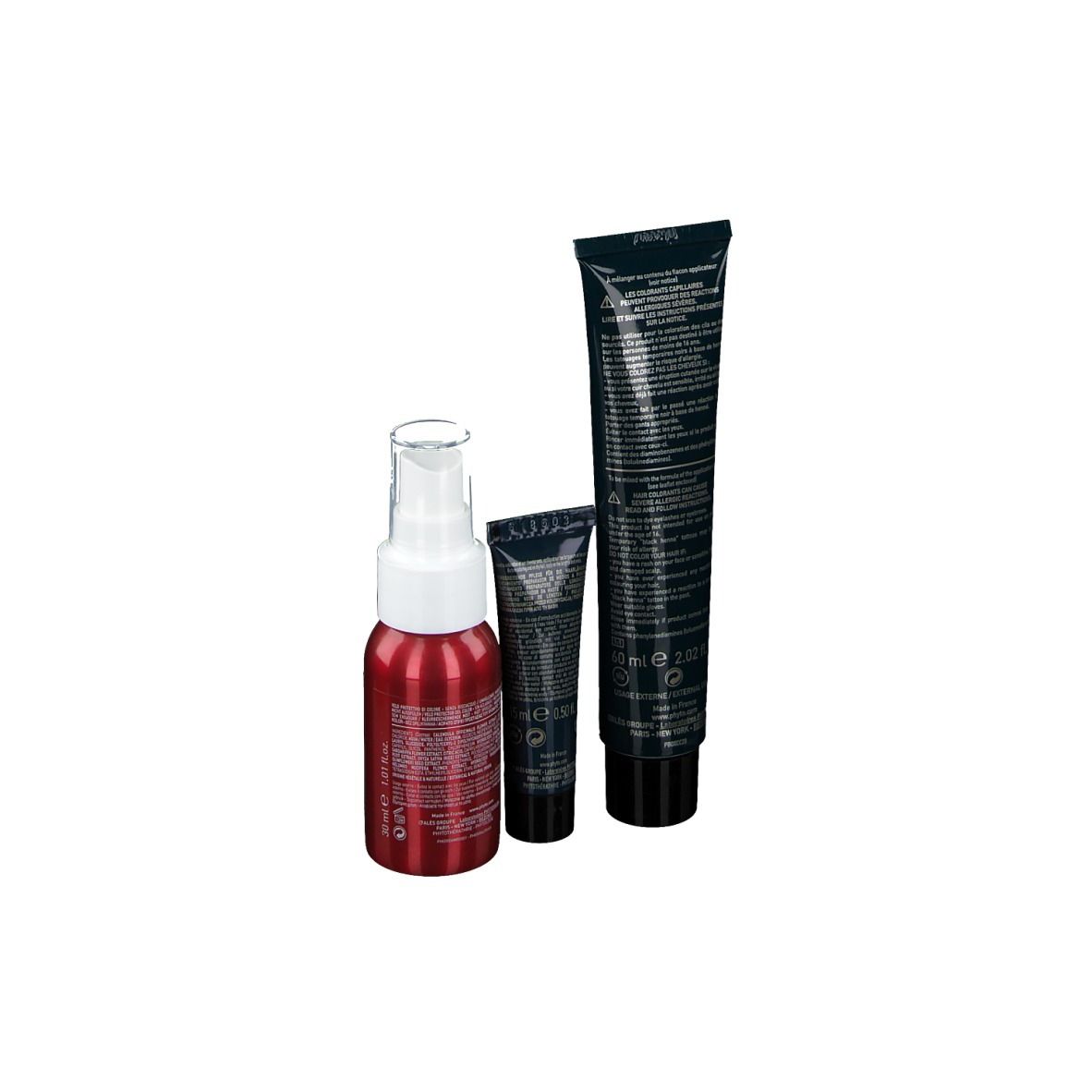 Trois produits : teinture capillaire, petit tube et flacon pulvérisateur. Tous noirs et rouges avec des détails blancs. Inscription : Phyto Phytocolor Box 7,7 Blond Marron.