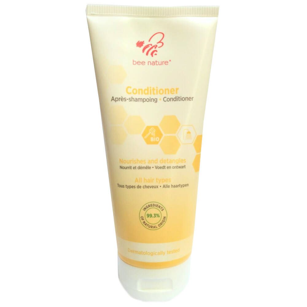Tube de crème avec nom du produit et logo. Inscription : Conditioner. Contient 99,3% d'ingrédients naturels.
