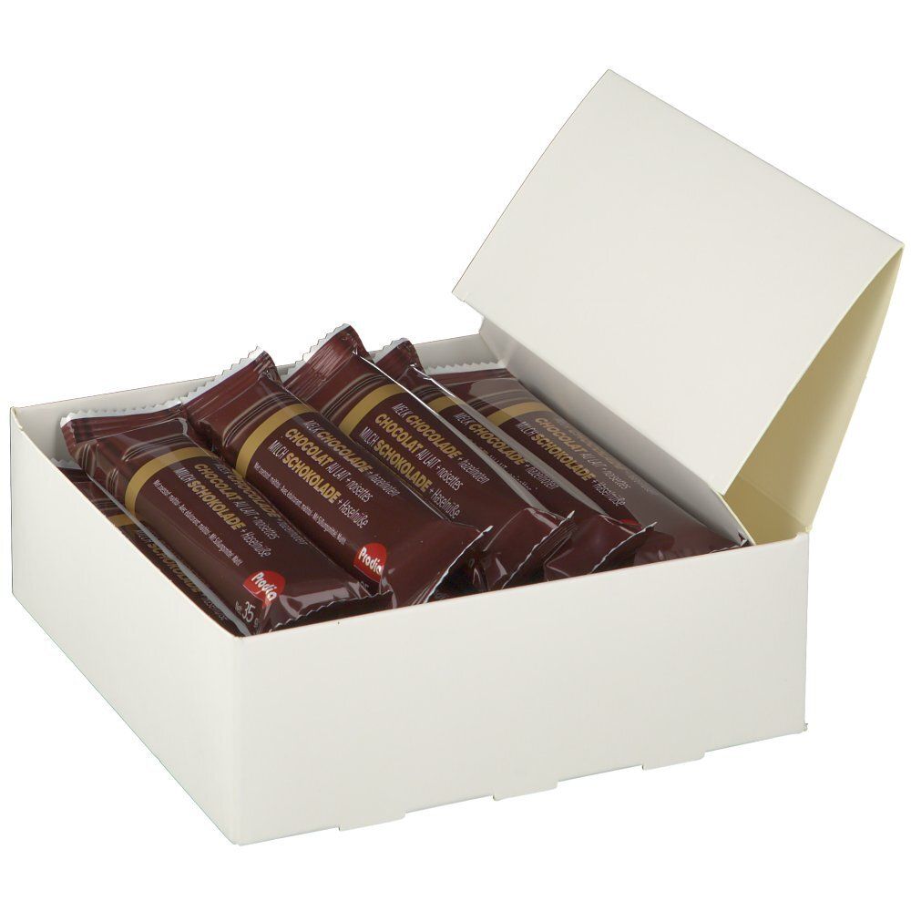Boîte blanche ouverte avec plusieurs barres chocolatées emballées en marron. Marque: Prodia.