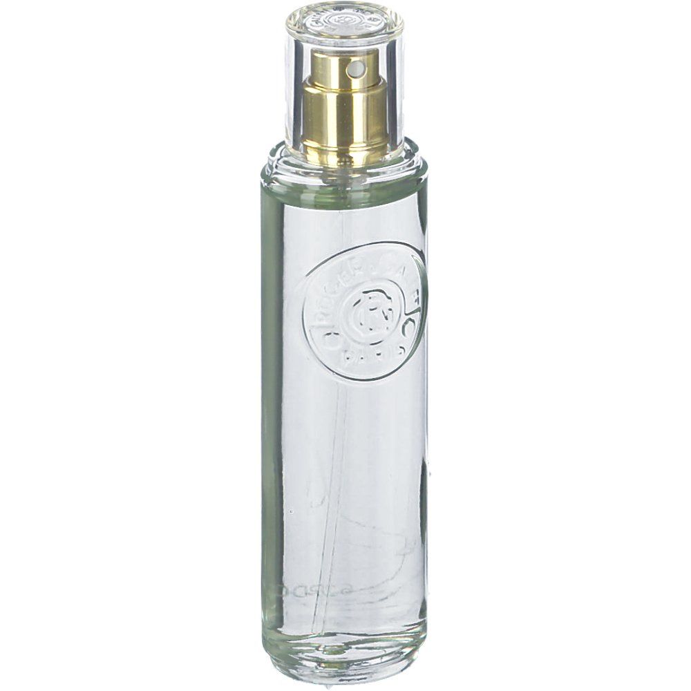 Flacon cylindrique en verre avec vaporisateur. Transparent, avec vaporisateur doré et capuchon transparent. Logo en relief sur le devant.