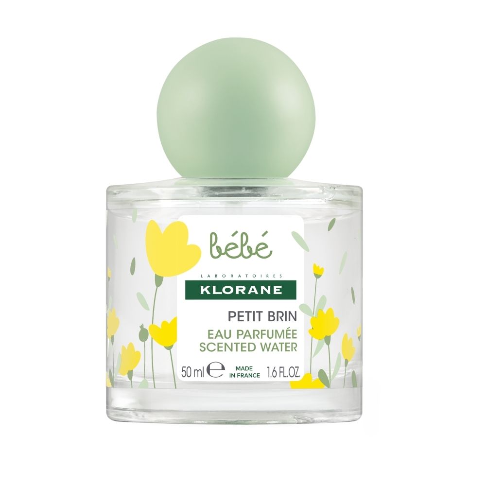 Klorane Bébé Petit Brin Eau Parfumé, flacon 50ml avec bouchon bleu et motif floral.