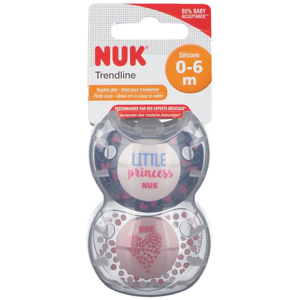 Deux sucettes dans un emballage transparent. Inscriptions : NUK, Trendline, 0-6 m, Little Princess. Emballage avec crochet.