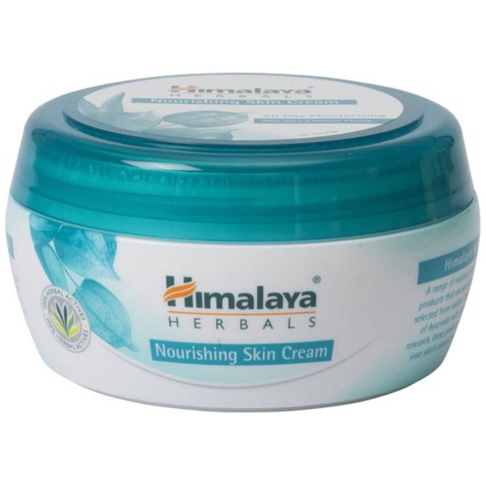 Pot de crème avec couvercle bleu. Inscription : Himalaya Herbals Nourishing Skin Cream. Logo avec feuilles.