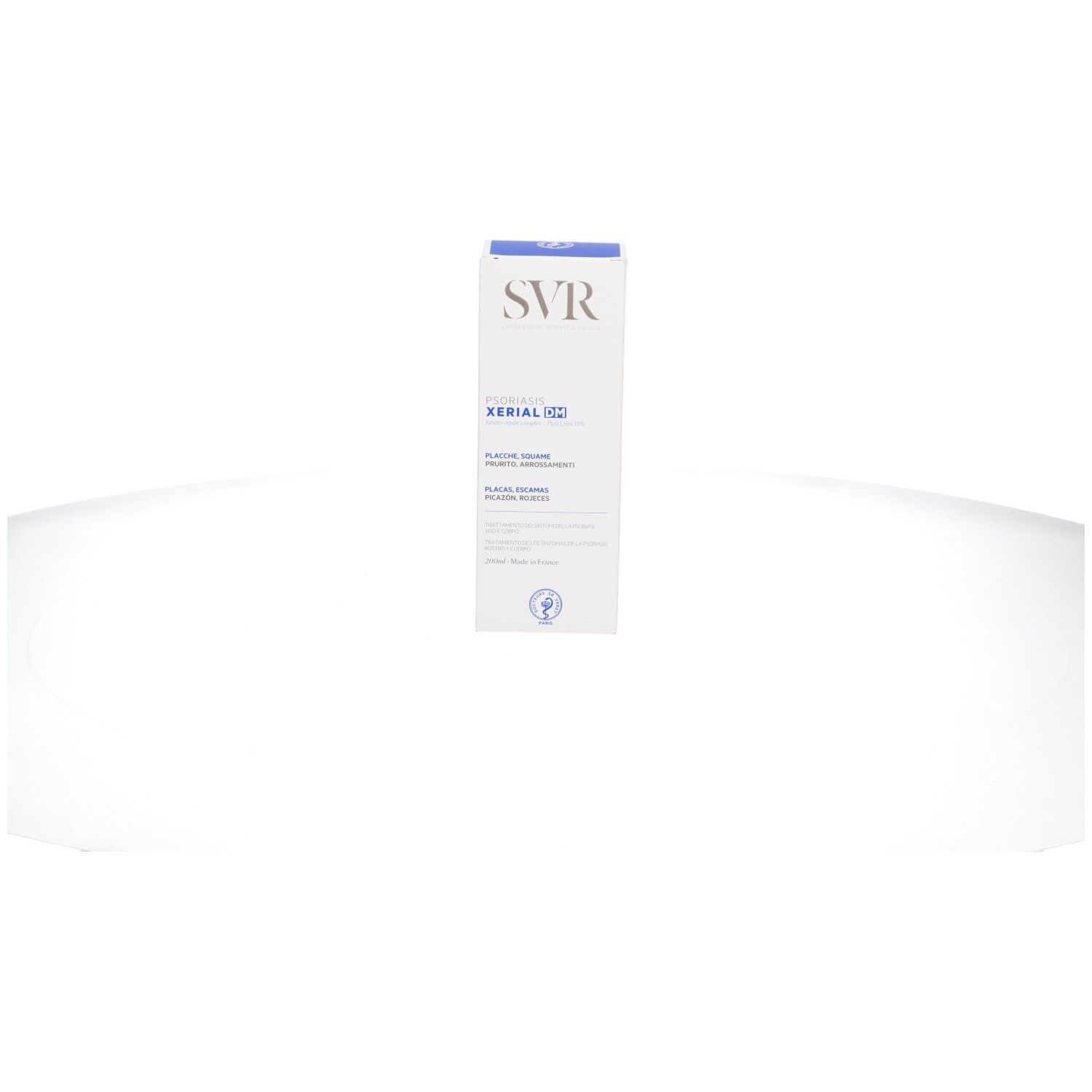 Boîte SVR XERIAL DM Psoriasis. Logo et nom du produit. Texte: Plaques, Squames, Démangeaisons, Rougeurs.